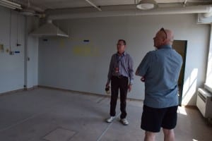 Left to right: Jim Tovey, Lou Klevinas visiting upper-level room at Small Arms Building. Jaan Pill photo