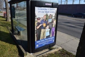 Poster at bus shelter, Lakeshore Road East and Dixie Road. Jaan Pill photo