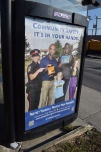 Poster at bus shelter, Lakeshore Road East and Dixie Road. Jaan Pill photo