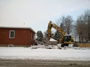 The photo, from Feb. 17, 2016, shows demolition work proceeding at 20 James Street in a manner - that is, because of the absence of construction fencing - that demonstrates disregard for public safety. ‎ A local resident called 311 on the morning of Feb. 17 and received a response that said: "Thank you for contacting 311 Toronto. Your email has been forwarded to Toronto Building inspections  for review / response / resolution. If you do not receive a reply within three business days, please contact them at 416.394.8055." As it turned out, construction fencing did appear at the site later on  Feb. 17, 2016. Photo source: A resident of Long Branch