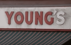 In accordance with the Quebec language legislation, a sign such as "Young's" had to be changed to "Young" so that the word was changed from English to French.