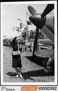 The photo is from an April 5, 2017 tweet from the Archives of Ontario‏ @ArchivesOntario: "Elsie MacGill was Canada's first female engineer. She led the production of Hawker Hurricane fighter planes during #WWII."