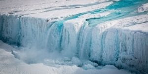 A 130-metre-wide waterfall drains meltwater from the Nansen Ice Shelf into the ocean. Image: Stuart Rankin via Flickr. The image is from the April 22, 2017 Climate News Network article mentioned at the page you are now reading.