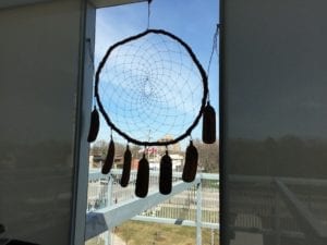 Dream Catcher in window at Aboriginal Resource Centre at Humber College. Artist: Brian Klyne