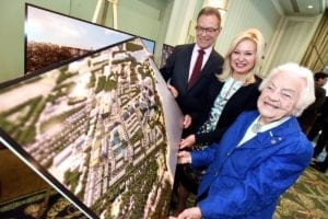 Images is from a tweet from Rob Beintema‏ @RobAtTheNews; caption reads: @BonnieCrombie @JimTovey and Hazel McCallion unveil new West Village plans for 72 acre Port Credit former refinery site. #mississauga