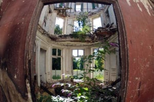 Inside view of an abandoned 19th-century manor in Goussainville-Vieux Pays, 20 kilometers north of Paris, on September 9, 2013. In 1972, the farming village of 144 homes found itself under the direct flight path of Roissy's Charles de Gaulle Airport when it opened. Residents started to abandon their homes, unable to endure the constant noise of the passenger planes flying overhead. Nowadays, only a few families remain living in what has become almost a ghost village.