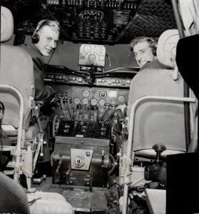 In cockpit of the R.C.A.F. North Star which carried Gordon Jarrett; Toronto ex-flying officer; on his just completed two-way ocean crossing are F.O. Earl Banks; pilot; and F.O. G. W. Webb.