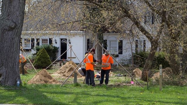The photo is from the May 13, 2016 Mississauga News article for which a link is posted at the page you are now reading. The caption, from the news story reads: "Dig - Photo by Bryon Johnson - An archeological assessment is taking place at a former residential property on Stavebank Road."